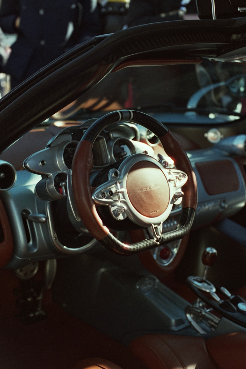 the interior of a car with a steering wheel