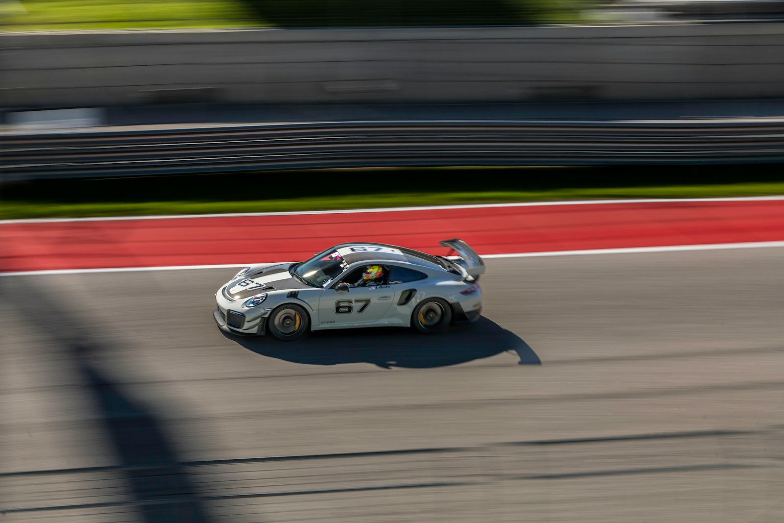 a race car driving down a race track